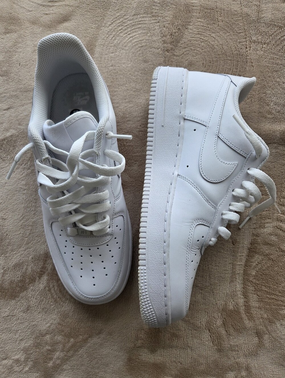 Nike Air Force 1 Low sneakers in a white colorway 9.5